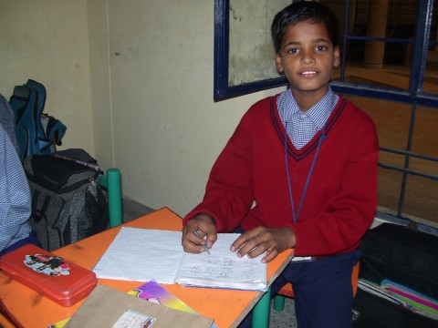Kamruddin attending classes at Amar Jyoti School